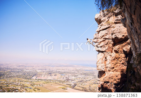 Nature, rock climbing and space with man on mountain for fitness, adventure and challenge. Fearless, workout and hiking with person training on cliff for travel, freedom and exercise mockup Nature, rock climbing and space with man on mountain for fitness, adventure and challenge. Fearless, workout and hiking with person training on cliff for travel, freedom and exercise mockup 138871363