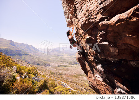 Sports, rock climbing and adventure with woman on mountain for fitness, health or challenge. Explore, workout and hiking with person training on cliff in nature for travel, freedom or exercise mockup Sports, rock climbing and adventure with woman on mountain for fitness, health or challenge. Explore, workout and hiking with person training on cliff in nature for travel, freedom or exercise mockup 138871380