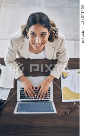 Top view, portrait or business worker on laptop in company finance management, investment strategy or global financial growth. Smile, happy or woman typing on technology for budget planning or ideas 138871459