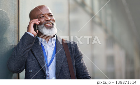 Phone call, idea and a business black man in the city with mockup for communication or networking. Contact, thinking and 5g mobile technology with a senior male manager talking on his smartphone Phone call, idea and a business black man in the city with mockup for communication or networking. Contact, thinking and 5g mobile technology with a senior male manager talking on his smartphone 138871514