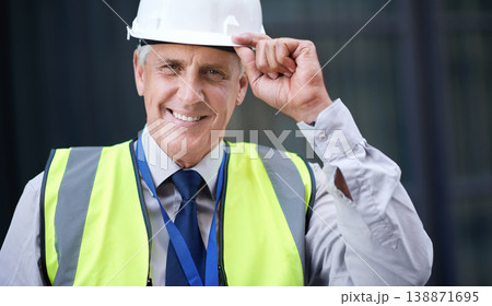 Man, construction and engineer and portrait outdoor for building project management. Face of senior contractor person with helmet for civil engineering, safety and development at site with a smile 138871695
