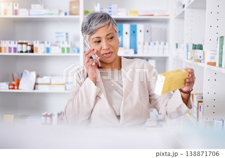 Phone call, woman in pharmacy with box of medicine, consulting for healthcare product information. Telehealth, pharmaceutical advice and senior person with decision, choice and cellphone consultation Phone call, woman in pharmacy with box of medicine, consulting for healthcare product information. Telehealth, pharmaceutical advice and senior person with decision, choice and cellphone consultation 138871706