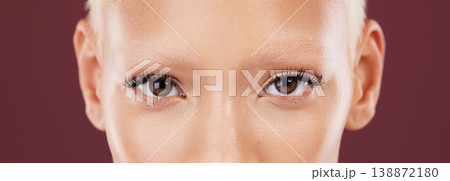 Portrait, woman eyes and beauty makeup with mascara and eyebrows bleached in a studio. Cosmetics, eyebrow treatment and self care for lashes close up of a young model with isolated brown background Portrait, woman eyes and beauty makeup with mascara and eyebrows bleached in a studio. Cosmetics, eyebrow treatment and self care for lashes close up of a young model with isolated brown background 138872180