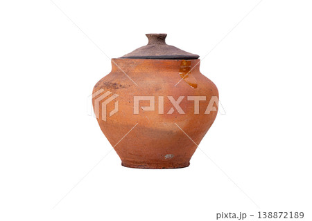 Rustic Clay Pitcher with Handle Isolated on White. Antique Rustic earthenware jug with Aged Terracotta surface Rustic Clay Pitcher with Handle Isolated on White. Antique Rustic earthenware jug with Aged Terracotta surface 138872189