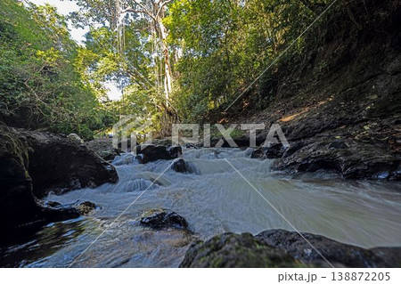 Fast flowing jungle stream with rocks Panama Fast flowing jungle stream with rocks Panama 138872205