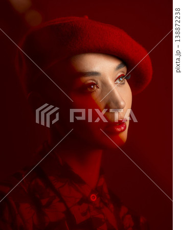 Woman, fashion and makeup with red aesthetic, beauty and art deco with vintage hat isolated on studio background. Retro style, female model with thinking face and cosmetics, attractive and bold Woman, fashion and makeup with red aesthetic, beauty and art deco with vintage hat isolated on studio background. Retro style, female model with thinking face and cosmetics, attractive and bold 138872238