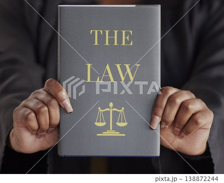 Hands, woman or judge with book, constitution research or education for learning the justice system. Lawyer, advocate or closeup of attorney studying knowledge, guide or information for legal agency 138872244