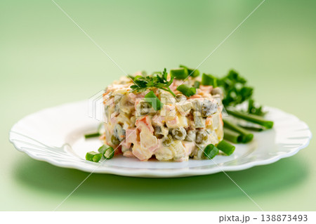 delicious creamy potato salad with peas carrots and green onion delicious creamy potato salad with peas carrots and green onion 138873493