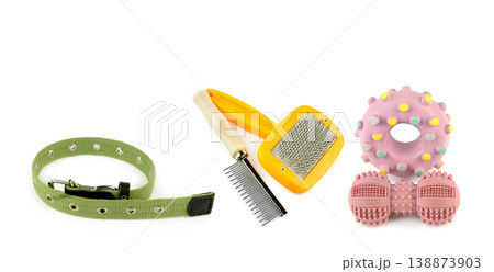 Professional Dog Grooming Tools, Collar, and Rubber Toys 138873903
