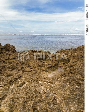 The beautiful aerial view of the morning on the beach with blue sea water in Kaur, Bengkulu, Indonesia The beautiful aerial view of the morning on the beach with blue sea water in Kaur, Bengkulu, Indonesia 138874016