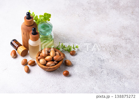 Moroccan argan seeds and oil for hair care 138875272