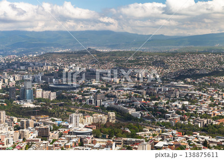 Expansive aerial view of Tbilisi city on a cloudy day 138875611