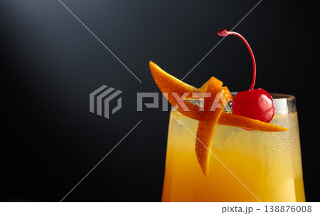 Cocktail Tequila sunrise with orange juice, silver tequila, grenadine, and ice. Cocktail Tequila sunrise with orange juice, silver tequila, grenadine, and ice. 138876008