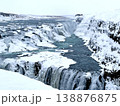 Panoramic winter view of Gullfoss waterfall in Iceland with frozen ice and snow. 138876875