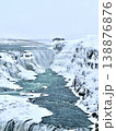 Vertical view of Gullfoss waterfall in winter, Iceland. Majestic frozen river canyon. 138876876