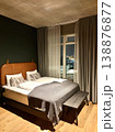 Modern luxury hotel bedroom interior with cozy bed and city night view, Iceland. 138876877
