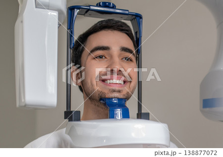 Close up of man during dental panoramic radiography 138877072