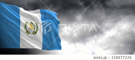 National flag of Guatemala with dark clouds, 3D rendering National flag of Guatemala with dark clouds, 3D rendering 138877226