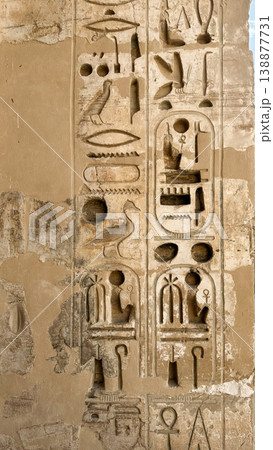 Beautiful bas-reliefs and ancient hieroglyphs from the mortuary temple of Ramesses III at Medinet Habu, Luxor, Egypt. Beautiful bas-reliefs and ancient hieroglyphs from the mortuary temple of Ramesses III at Medinet Habu, Luxor, Egypt. 138877731