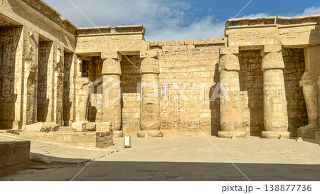Medinet Habu, the mortuary temple of Ramesses III, located on the west bank of Luxor, Egypt. Medinet Habu, the mortuary temple of Ramesses III, located on the west bank of Luxor, Egypt. 138877736