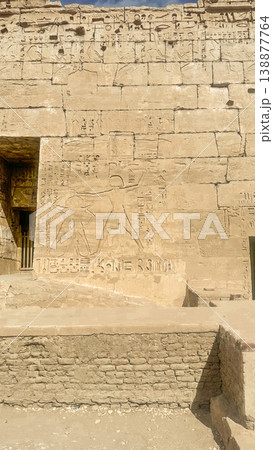 Medinet Habu, the mortuary temple of Ramesses III, located on the west bank of Luxor, Egypt. Medinet Habu, the mortuary temple of Ramesses III, located on the west bank of Luxor, Egypt. 138877764