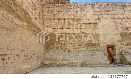 Medinet Habu, the mortuary temple of Ramesses III, located on the west bank of Luxor, Egypt. 138877767