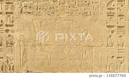 Beautiful bas-reliefs and ancient hieroglyphs from the mortuary temple of Ramesses III at Medinet Habu, Luxor, Egypt. Beautiful bas-reliefs and ancient hieroglyphs from the mortuary temple of Ramesses III at Medinet Habu, Luxor, Egypt. 138877769