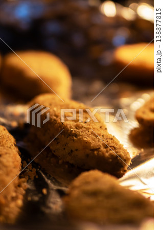 Cozy kitchen scene featuring freshly prepared cookies with soft focus and ambient lighting Cozy kitchen scene featuring freshly prepared cookies with soft focus and ambient lighting 138877815