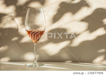 Rose Wine Glasses under Sunlight. Elegant Spring Still Life Rose Wine Glasses under Sunlight. Elegant Spring Still Life 138877906