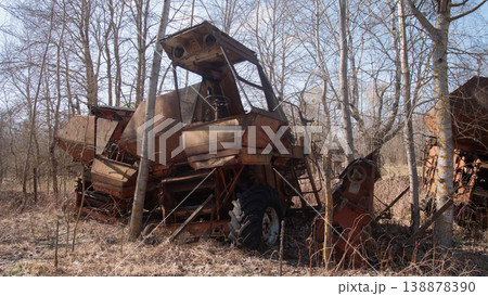Closeup Of Broken Tractor Cabin, Windowless Frame And Rusted Controls With Peeling Paint, Birch Trunks Framing 138878390
