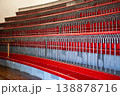Historic auditorium interior, red benches, wooden table, vintage architecture, empty hall 138878716
