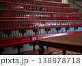 Historic Auditorium Interior with Red Benches and Wooden Table 138878718