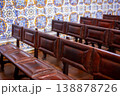 Rows of Wooden Benches in a Historical Interior with Azulejo Tiled Walls 138878726