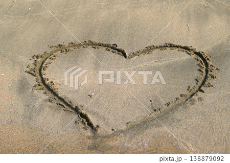 Heart drawn on the beach sand Heart drawn on the beach sand 138879092
