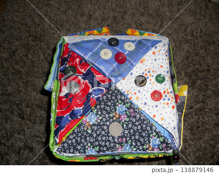 A cushion made of cloth. Toy pillows for children. Homemade toys. A cushion made of cloth. Toy pillows for children. Homemade toys. 138879146