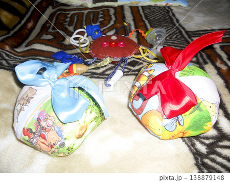 A cushion made of cloth. Toy pillows for children. Homemade toys. A cushion made of cloth. Toy pillows for children. Homemade toys. 138879148
