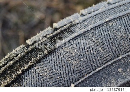 Hoarfrost on a rubber tire wheel Hoarfrost on a rubber tire wheel 138879154