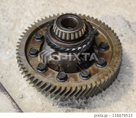 Dismantled box car transmissions. Gear with bearings. The gears on the shaft of a mechanical transmission. 138879513