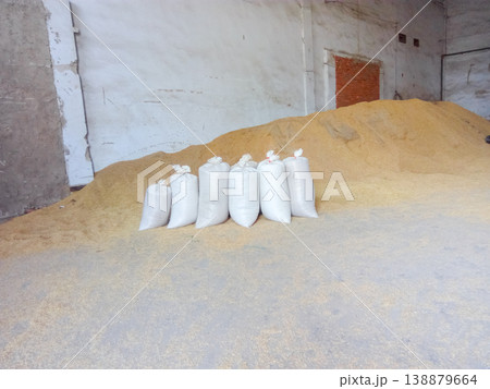 Heap of grains of barley and wheat in stock Heap of grains of barley and wheat in stock 138879664