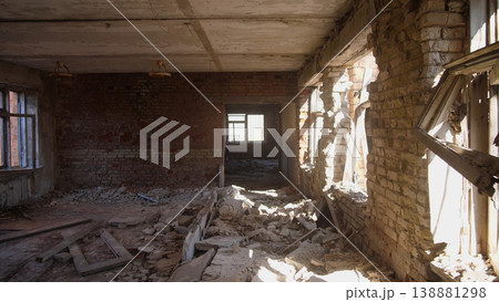 Sunlit Ruined Room With Scattered Timber And Cracked Plaster Near Window, Soft Warm Light Cutting Through Dust Contemplative Scene Reflecting Civilian Aftermath And Photographic Survey 138881298