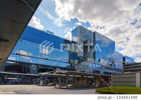 Kyoto, Japan - Oct 11 2024, Panoramic view of the glass facade of Kyoto Railway Station, bus station in the foreground, at daytime, Kyoto, Japan 138881490