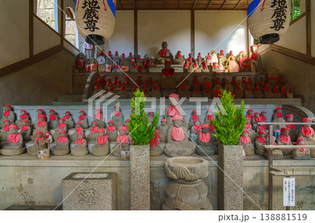 Kyoto, Japan - Oct 11 2025, Panoramic view of hall filled with stone statues of red scarves of god Jizo, the patron saint of small children, at Kiyomizu dera Temple, at daytime, Kyoto, Japan Kyoto, Japan - Oct 11 2025, Panoramic view of hall filled with stone statues of red scarves of god Jizo, the patron saint of small children, at Kiyomizu dera Temple, at daytime, Kyoto, Japan 138881519