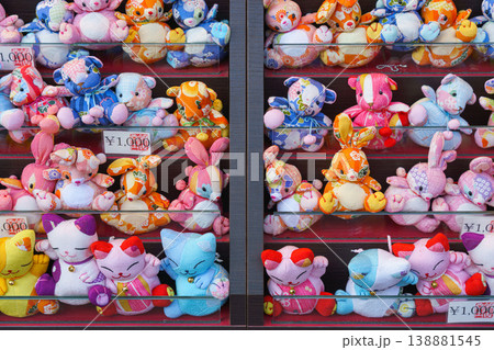 Kyoto, Japan - Oct 11 2024, A close-up view of a counter with a variety of colorful plush toys of animals, rabbits, bears, cats, Kyoto, Japan Kyoto, Japan - Oct 11 2024, A close-up view of a counter with a variety of colorful plush toys of animals, rabbits, bears, cats, Kyoto, Japan 138881545