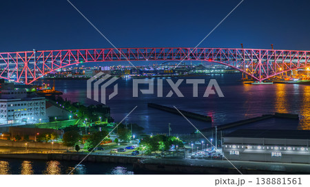 Osaka, Japan - Oct 11 2024, Panoramic view from the sea of the Minato bridge crossing Osaka Bay, at night with illumination, Osaka, Japan 138881561