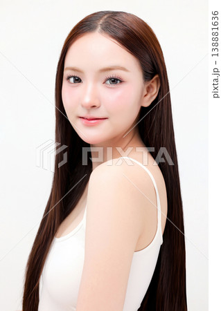 Portrait beautiful young Asian woman with K beauty style makeup and perfect skin on isolated white background. Facial and skin care concept for commercial advertising. Portrait beautiful young Asian woman with K beauty style makeup and perfect skin on isolated white background. Facial and skin care concept for commercial advertising. 138881636