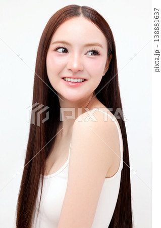 Portrait beautiful young Asian woman with K beauty style makeup and perfect skin on isolated white background. Facial and skin care concept for commercial advertising. Portrait beautiful young Asian woman with K beauty style makeup and perfect skin on isolated white background. Facial and skin care concept for commercial advertising. 138881637