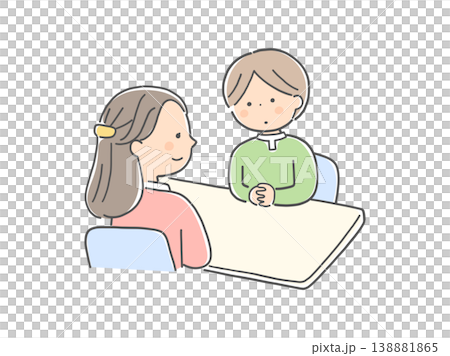 対面で話し合う子供と女性カウンセラー 138881865