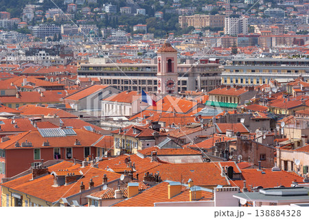 Red tiled rooftops and clock tower in Nice, France 138884328
