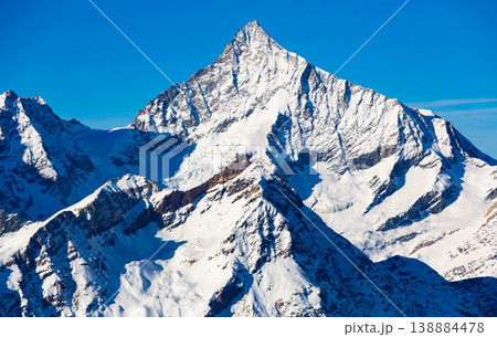 Winter landscape of mountain peaks located near the of Zermatt Winter landscape of mountain peaks located near the of Zermatt 138884478
