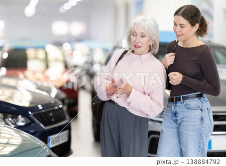 Young woman buys a new car for her elderly mother 138884792